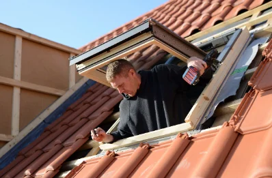 Pose de fenêtres de toit Velux au Tholy